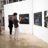 Artist Dina Goldstein at the Busan Photography Festival Exhibition 2022 showing her series 10 Commandments with American Presidents