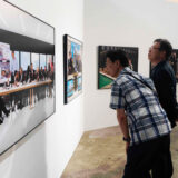 Artist Dina Goldstein at the Busan Photography Festival Exhibition 2022 showing her series 10 Commandments with American Presidents